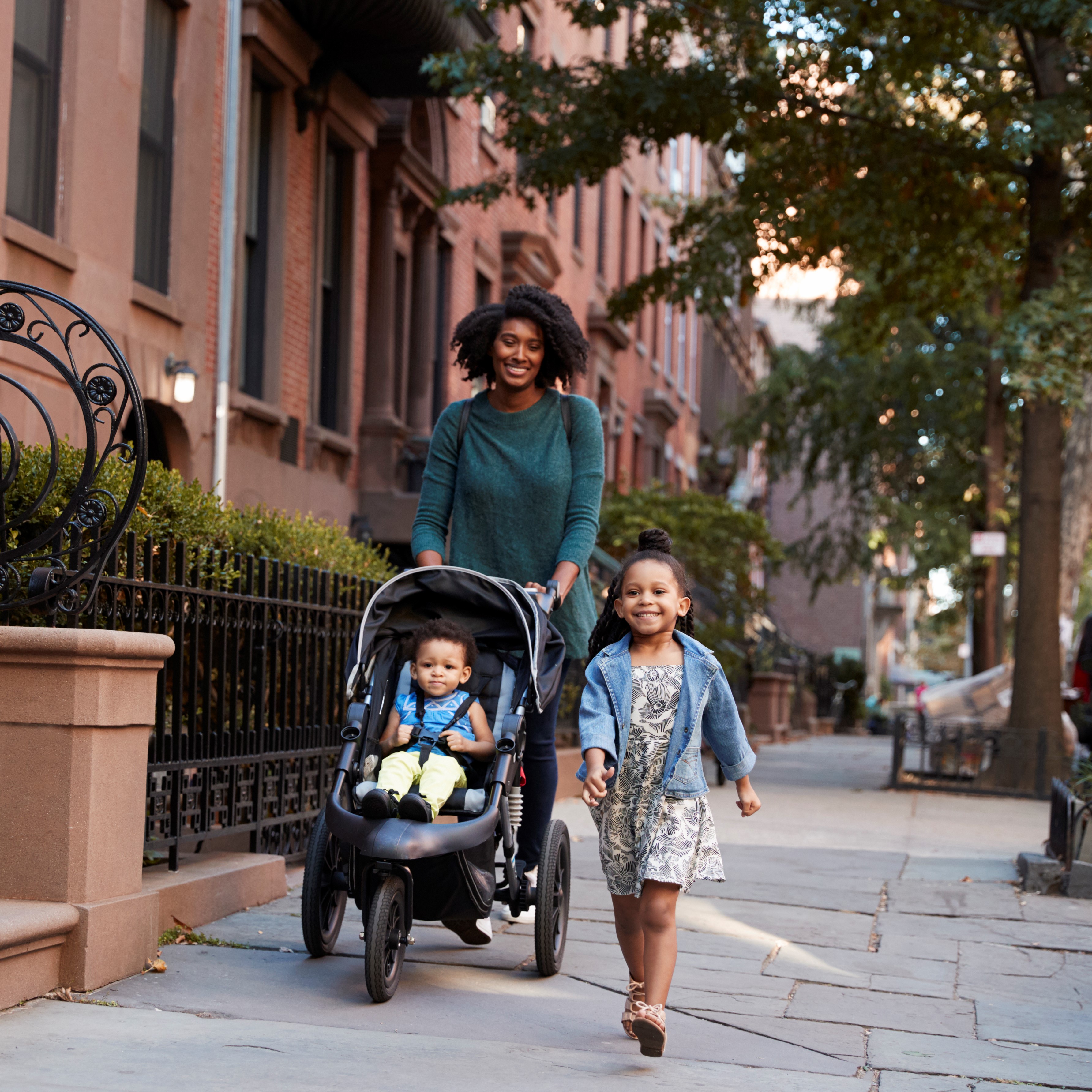Mother Pushing Stroller